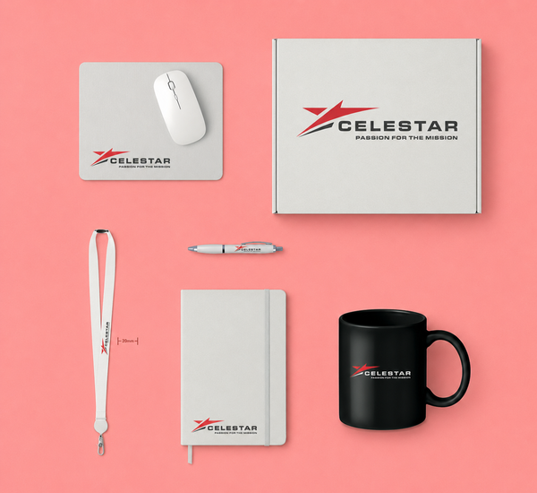 Collection of Celestar branded items including a mouse pad, box, mug, notebook, pen, and lanyard on a pink background.