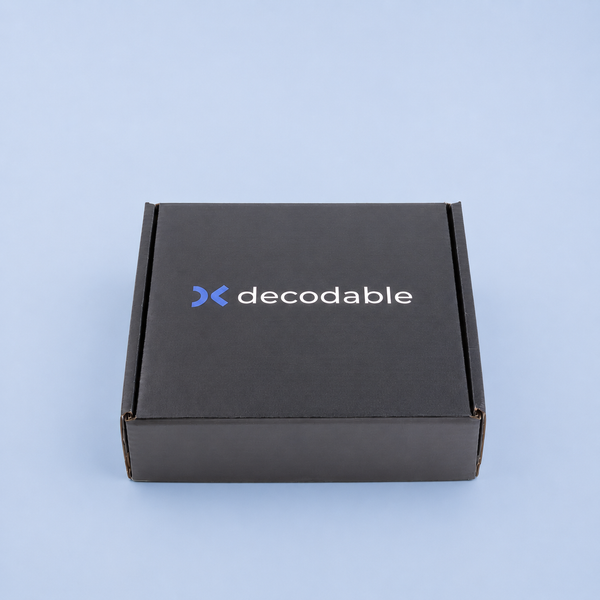 Black box with 'decodable' logo on a light blue background